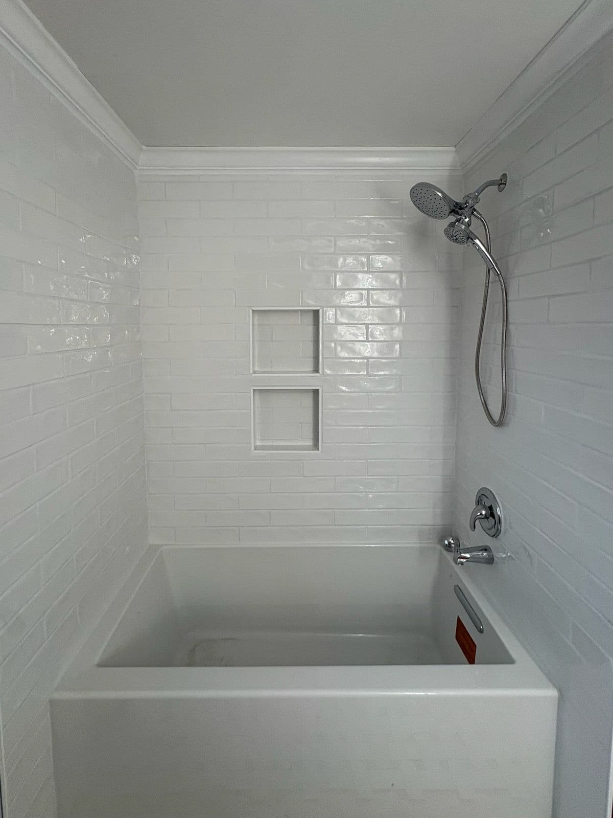 Bathroom Upgrade with Ceramic Tile Tub Surround image